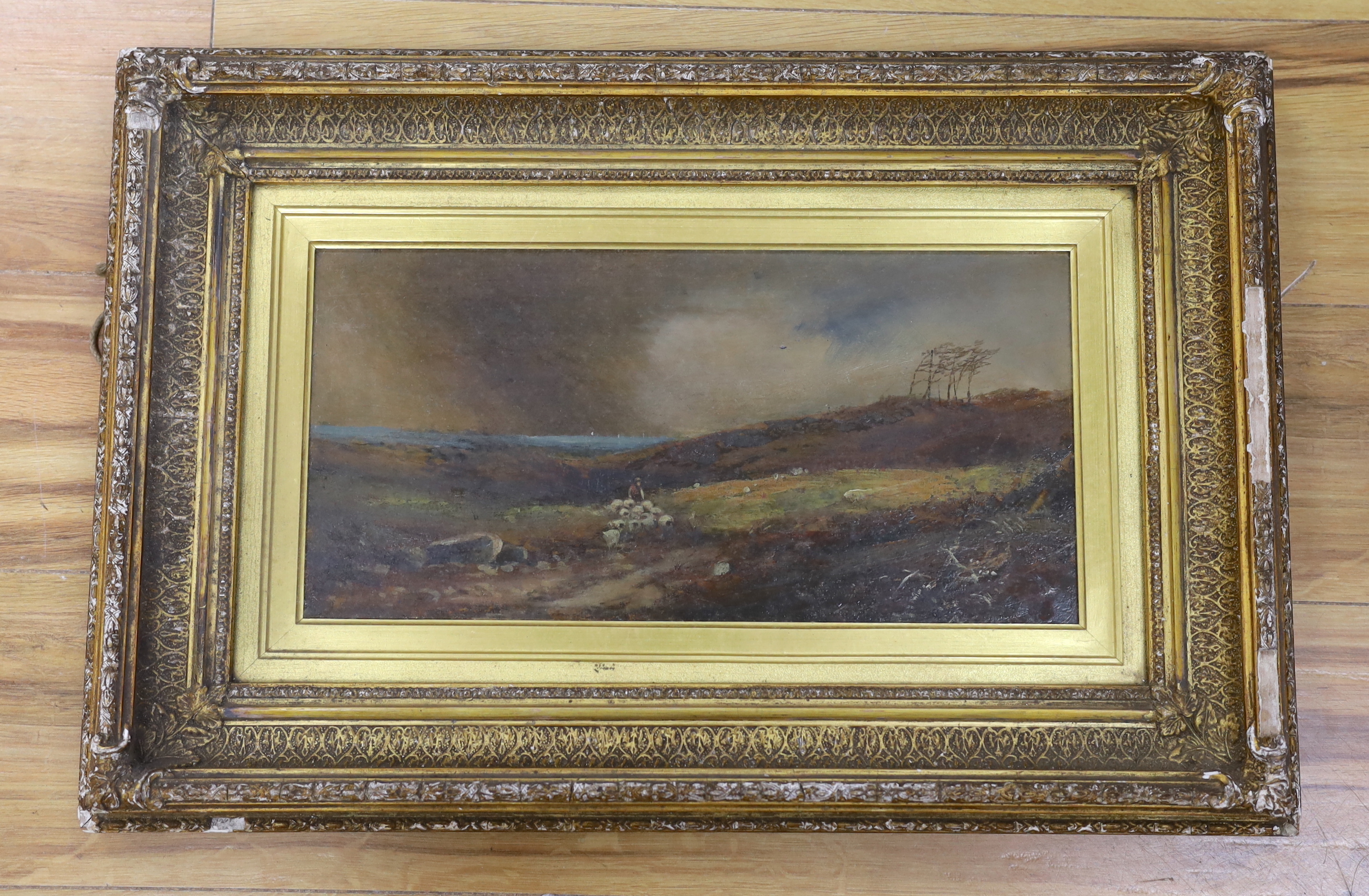 19th century school, oil on canvas, Rural landscape with shepherd and flock of sheep, 39 x 19cm, ornate gilt frame